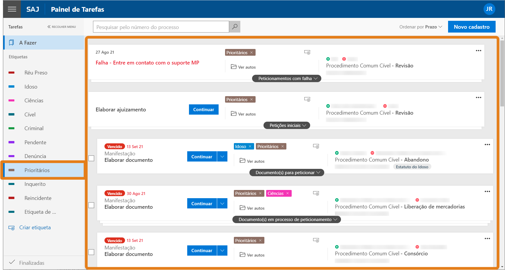 Painel de tarefas do sistema SAJ com lista de atividades. Destaque em laranja na seção ‘Prioritários’, contendo tarefas como ‘Elaborar ajuizamento’ e ‘Elaborar documento’