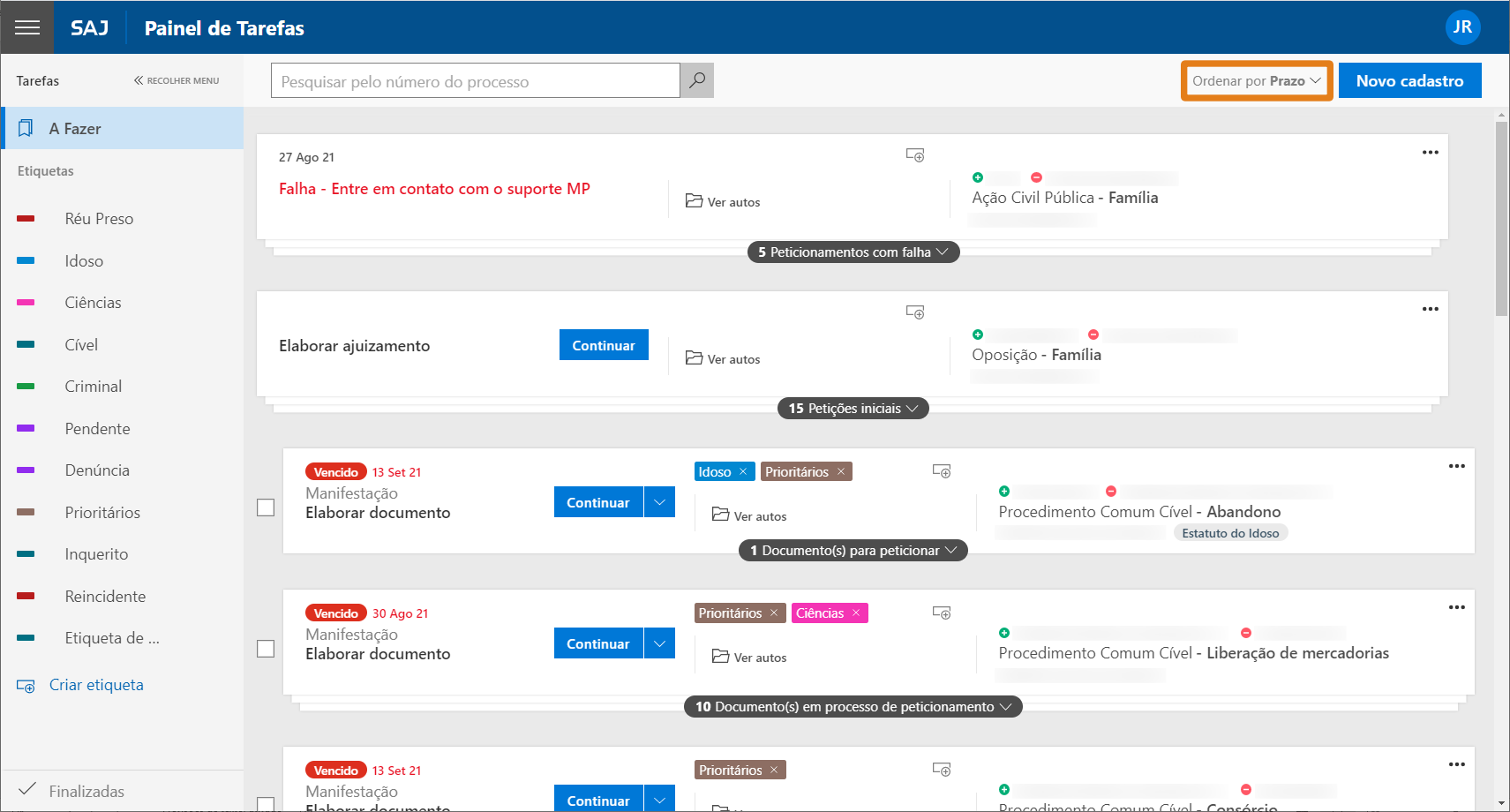 Painel de tarefas do sistema SAJ com lista de atividades. No canto superior direito, destaque em laranja no botão ‘Ordenar por Prazo’.